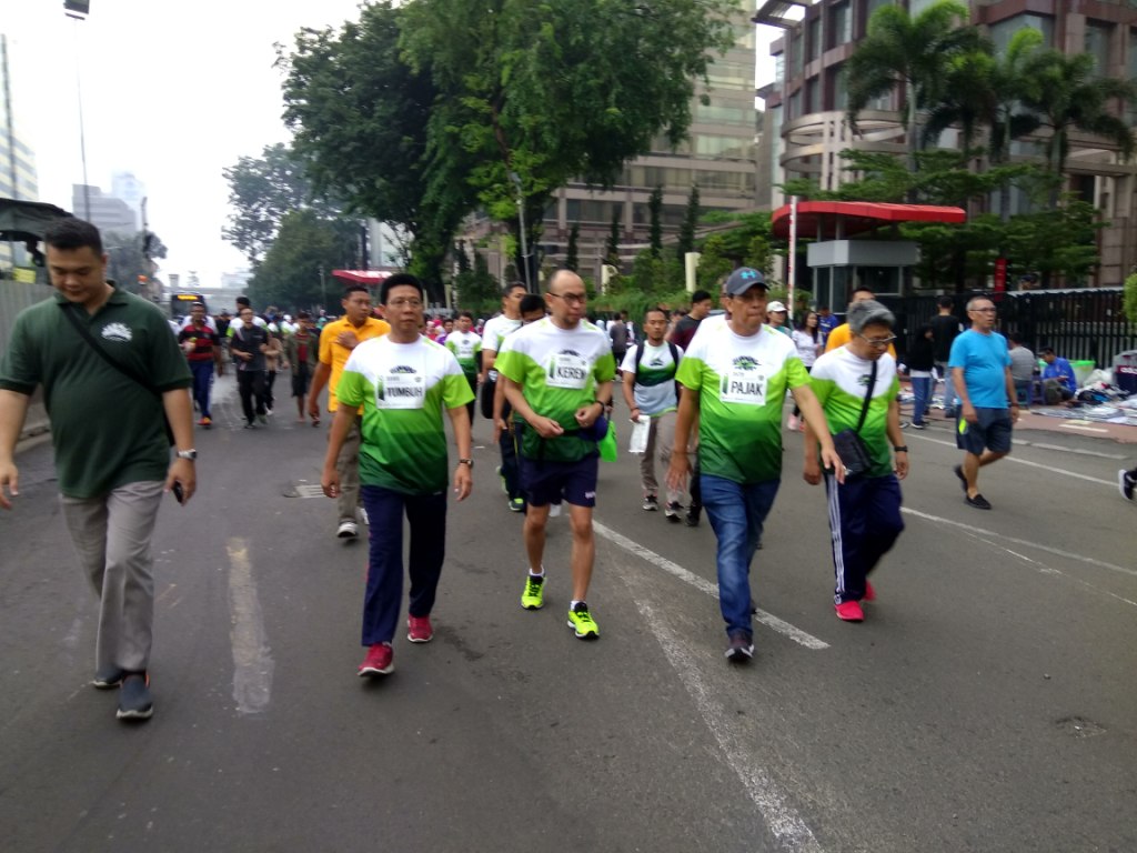 Dirjen Pajak tengah mengikuti kegiatan Running Tax 5K